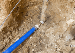 A plumbing water line in the ground